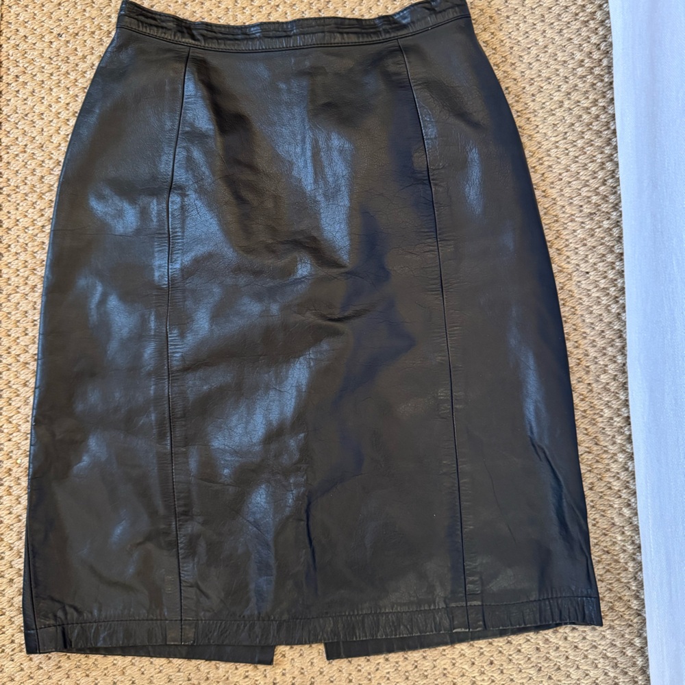 Vintage designer authentic leather high waisted skirt. Zipper in back. Size 10